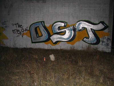 Chrome and Orange Stylewriting by urine and OST. This Graffiti is located in Bitterfeld, Germany and was created in 2006. This Graffiti can be described as Stylewriting and Street Bombing.