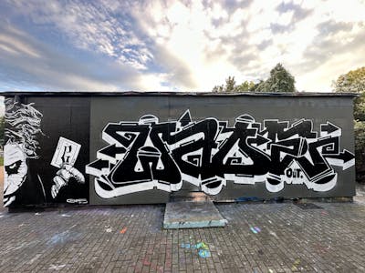 Black and Grey and White Stylewriting by Gaps and wade. This Graffiti is located in Leipzig, Germany and was created in 2023. This Graffiti can be described as Stylewriting, Characters and Wall of Fame.