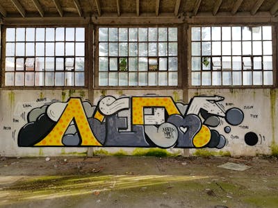 Grey and Yellow Stylewriting by Nerv. This Graffiti is located in Novi Sad, Serbia and was created in 2022. This Graffiti can be described as Stylewriting and Abandoned.