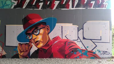 Red and Colorful Characters by Tris. This Graffiti is located in Angers, France and was created in 2023. This Graffiti can be described as Characters, Stylewriting, Streetart and Wall of Fame.