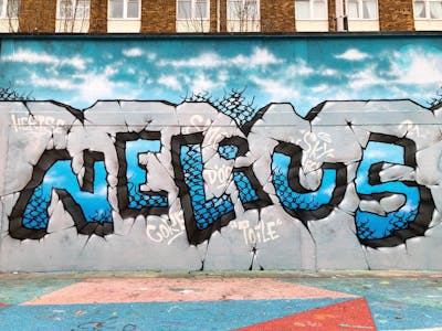 Light Blue and Grey Stylewriting by Nelius. This Graffiti is located in London, United Kingdom and was created in 2021. This Graffiti can be described as Stylewriting and Wall of Fame.