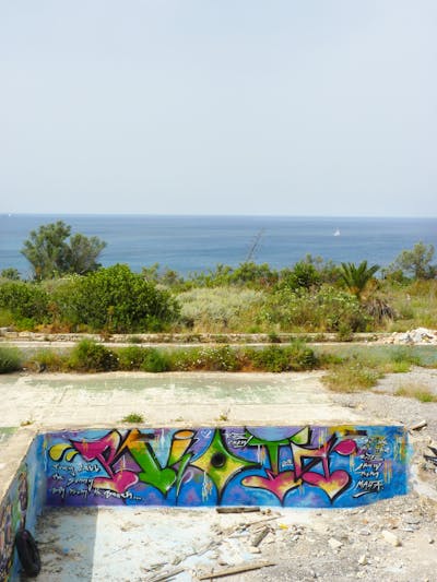 Colorful Stylewriting by Riots. This Graffiti is located in Malta and was created in 2014. This Graffiti can be described as Stylewriting and Abandoned.