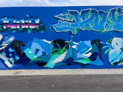 Blue and Light Blue and Light Green Stylewriting by Toyz, OneTwo, Myb, Terazos, Niemand and Manie. This Graffiti is located in Schärding, Austria and was created in 2022. This Graffiti can be described as Stylewriting and Wall of Fame.
