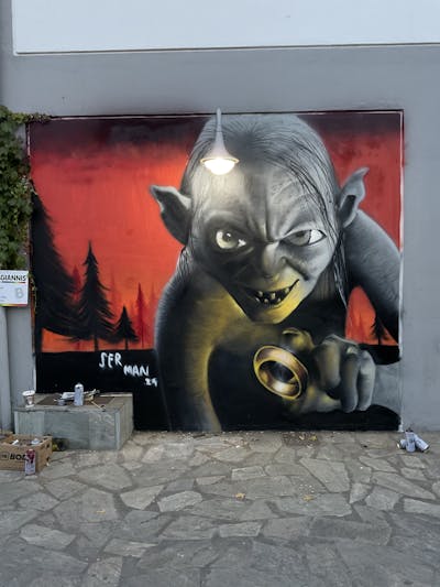 Grey and Red and Black Characters by serman. This Graffiti is located in Larisa, Greece and was created in 2023.