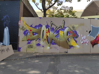 Beige and Violet Stylewriting by Dj Dookie and WKS. This Graffiti is located in Mainz, Germany and was created in 2022.