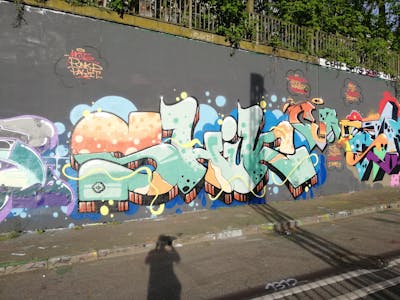 Light Green and Orange and Light Blue Stylewriting by shik. This Graffiti is located in Essen, Germany and was created in 2023. This Graffiti can be described as Stylewriting and Wall of Fame.