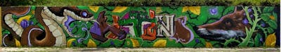 Brown and Green and Colorful Stylewriting by Aion, DUB and ANTI. This Graffiti is located in Porto, Portugal and was created in 2023. This Graffiti can be described as Stylewriting and Characters.