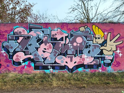 Coralle and Light Blue Stylewriting by Remo. This Graffiti is located in Magdeburg, Germany and was created in 2022. This Graffiti can be described as Stylewriting, Characters and Wall of Fame.