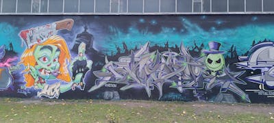 Grey and Colorful Stylewriting by KESOM, Costa and HCF. This Graffiti is located in Berlin, Germany and was created in 2023. This Graffiti can be described as Stylewriting and Characters.
