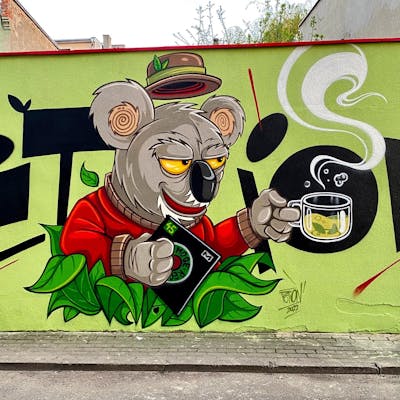 Light Green and Colorful Characters by PETION. This Graffiti is located in Kluczbork, Poland and was created in 2022. This Graffiti can be described as Characters and Wall of Fame.
