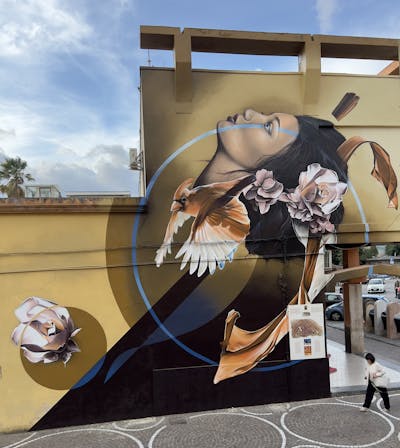 Beige and Black Characters by Team GOMAD. This Graffiti is located in Pompei, Italy and was created in 2022. This Graffiti can be described as Characters, Streetart and Murals.