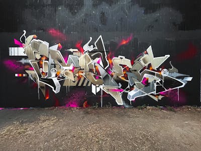 Beige and Colorful Stylewriting by Moseg and omseg. This Graffiti is located in Lörrach, Germany and was created in 2022.