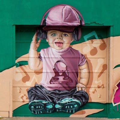 Beige and Coralle and Light Green Characters by shriner. This Graffiti is located in Radebeul, Germany and was created in 2022. This Graffiti can be described as Characters, Murals and Special.