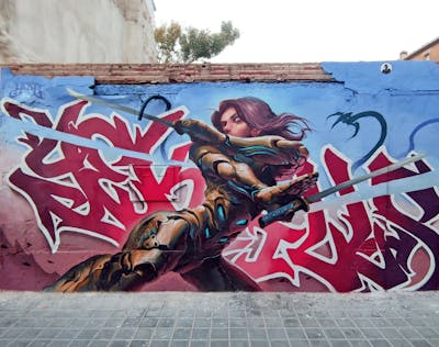 Red and Light Blue and Colorful Stylewriting by YEKO. This Graffiti is located in Valencia, Spain and was created in 2024. This Graffiti can be described as Stylewriting, Characters and Streetart.