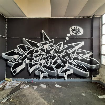 Black and White Stylewriting by Acide4000 and cbx. This Graffiti is located in Liège, Belgium and was created in 2022. This Graffiti can be described as Stylewriting and Abandoned.