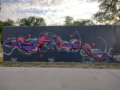 Coralle and Violet Stylewriting by Fakie. This Graffiti is located in Germany and was created in 2022. This Graffiti can be described as Stylewriting and Futuristic.
