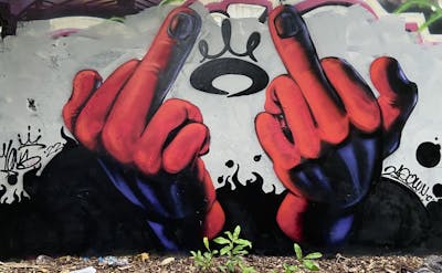 Red Characters by Mons and TWDC. This Graffiti is located in Bangkok BKK, Thailand and was created in 2022.