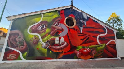 Light Green and Red Characters by Nexgraff. This Graffiti is located in Larraga, Spain and was created in 2021. This Graffiti can be described as Characters, Stylewriting, Murals and 3D.