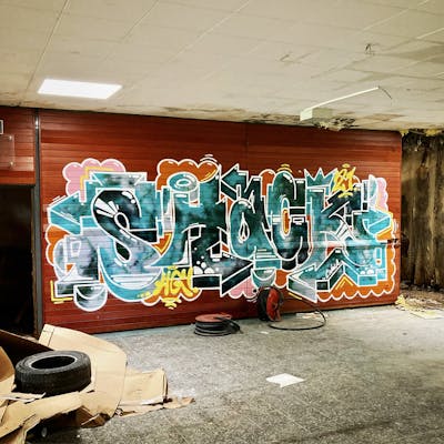 Cyan and Colorful Stylewriting by Shacky and HG crew. This Graffiti is located in Germany and was created in 2021. This Graffiti can be described as Stylewriting and Abandoned.