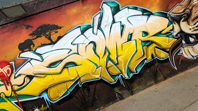 Yellow and Beige and Colorful Stylewriting by SQWR. This Graffiti is located in London, United Kingdom and was created in 2024.