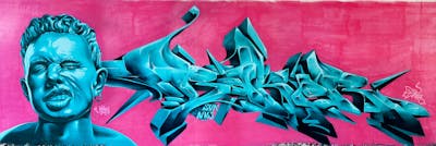 Cyan and Coralle Stylewriting by Bakeroner, Unikat and Baker. This Graffiti is located in Remscheid, Germany and was created in 2023. This Graffiti can be described as Stylewriting and Characters.