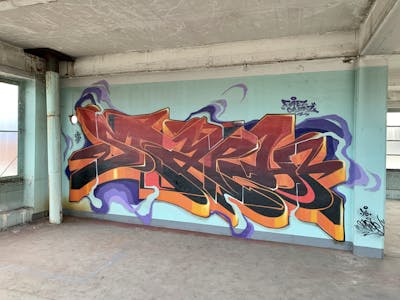 Orange and Violet Stylewriting by Kst, Alf, Twp, Yo and STAPH. This Graffiti is located in Saint-Etienne, France and was created in 2021. This Graffiti can be described as Stylewriting and Abandoned.
