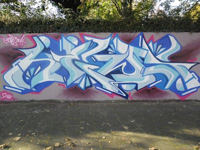 Light Blue and White Stylewriting by News. This Graffiti is located in Tilburg, Netherlands and was created in 2014. This Graffiti can be described as Stylewriting and Wall of Fame.