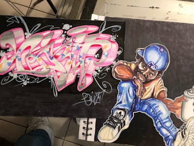 Coralle and Black and Light Blue Blackbook by XQIZIT. This Graffiti is located in Jamaica Queens, United States and was created in 2023. This Graffiti can be described as Blackbook.