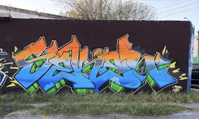 Colorful and Light Blue and Orange Stylewriting by Seker AHS. This Graffiti is located in Monterrey, Mexico and was created in 2023.