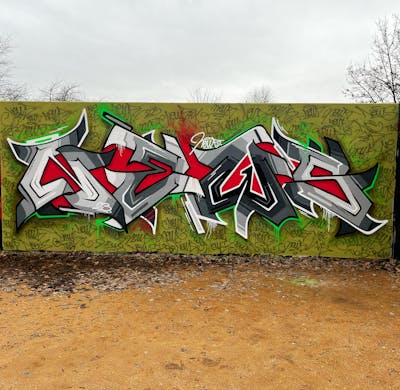 Grey and Red Stylewriting by News. This Graffiti is located in Regensburg, Germany and was created in 2023. This Graffiti can be described as Stylewriting and Wall of Fame.