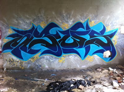 Blue and Yellow Stylewriting by News. This Graffiti is located in Walbrzych, Poland and was created in 2016. This Graffiti can be described as Stylewriting and Abandoned.