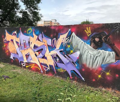 Colorful and Beige and Violet Stylewriting by TASKONE. This Graffiti is located in Zwickau, Germany and was created in 2021. This Graffiti can be described as Stylewriting and Characters.