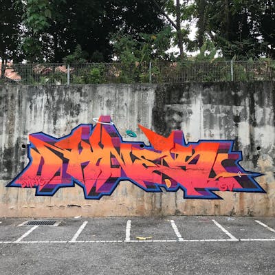 Orange and Violet Stylewriting by Nesyr. This Graffiti is located in Kuala Lumpur, Malaysia and was created in 2021. This Graffiti can be described as Stylewriting and Street Bombing.