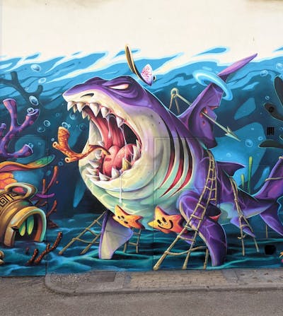 Colorful Characters by Abys. This Graffiti is located in Marbache, France and was created in 2022.