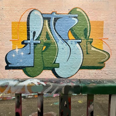 Light Blue and Light Green Stylewriting by Fate.01. This Graffiti is located in London, United Kingdom and was created in 2022. This Graffiti can be described as Stylewriting and Wall of Fame.