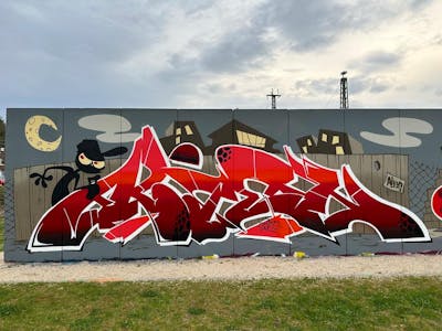 Red and Grey and White Stylewriting by Alien. This Graffiti is located in Wiesbaden, Germany and was created in 2023. This Graffiti can be described as Stylewriting and Characters.