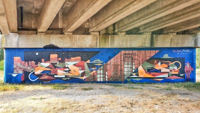 Colorful Stylewriting by Dr Clark and Maxime Ivanez. This Graffiti is located in Metz, France and was created in 2020. This Graffiti can be described as Stylewriting, Characters, Futuristic, Abandoned and Murals.