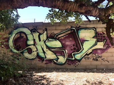 Light Green and Violet Stylewriting by SKOPE. This Graffiti is located in olhao, Portugal and was created in 2022.