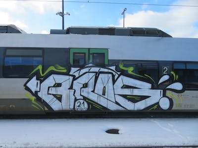 Chrome and Black Stylewriting by bros, rizok, R120K and teng. This Graffiti is located in Leipzig, Germany and was created in 2021. This Graffiti can be described as Stylewriting and Trains.
