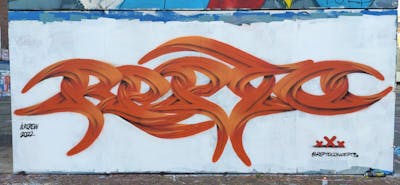 Orange and White Stylewriting by Repto and ILRCrew. This Graffiti is located in Milano, Italy and was created in 2022. This Graffiti can be described as Stylewriting, 3D and Wall of Fame.