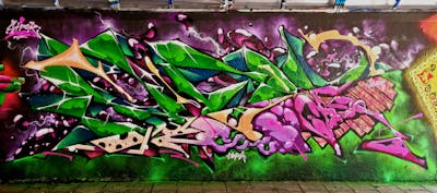 Colorful Stylewriting by SIDOK. This Graffiti is located in Eindhoven, Netherlands and was created in 2022. This Graffiti can be described as Stylewriting and Wall of Fame.