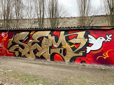 Red and Gold Stylewriting by sem and iws crew. This Graffiti is located in Berlin, Germany and was created in 2022.