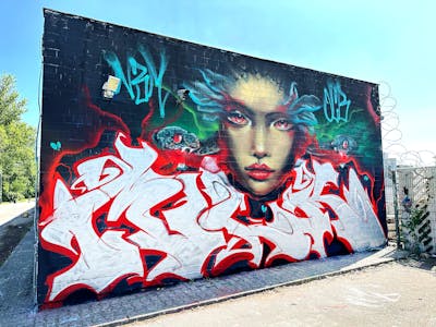 Red and White and Colorful Stylewriting by Milk21 and Cors One. This Graffiti is located in Berlin, Germany and was created in 2023. This Graffiti can be described as Stylewriting, Characters and Streetart.
