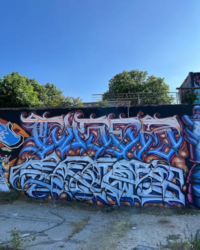 Light Blue and Orange Stylewriting by AWS CREW, CUSE and CWESK. This Graffiti is located in Vienna, Austria and was created in 2023. This Graffiti can be described as Stylewriting and Wall of Fame.
