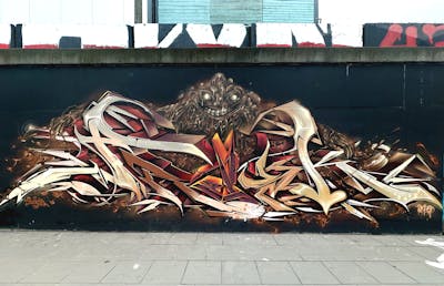 Beige and Brown and Colorful Stylewriting by Fresk. This Graffiti is located in Poznan, Poland and was created in 2024. This Graffiti can be described as Stylewriting, Characters and Wall of Fame.