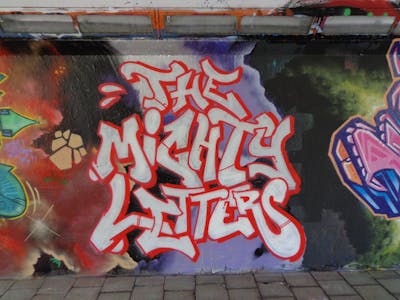 Colorful Stylewriting by TML The Mighty Letters. This Graffiti is located in Eindhoven, Netherlands and was created in 2012. This Graffiti can be described as Stylewriting and Wall of Fame.