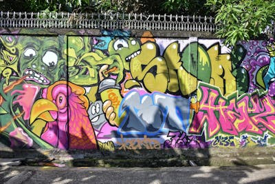 Colorful Stylewriting by Ente, skom, haze, bongnice and moske. This Graffiti is located in Jambi, Indonesia and was created in 2021. This Graffiti can be described as Stylewriting, Characters and Wall of Fame.