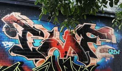 Red and Black and Beige Stylewriting by Chr15 and TMF. This Graffiti is located in Leipzig, Germany and was created in 2023. This Graffiti can be described as Stylewriting, Characters and Wall of Fame.