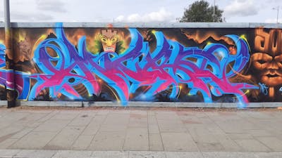 Colorful and Light Blue Stylewriting by Micro79. This Graffiti is located in North Hampton, United Kingdom and was created in 2022. This Graffiti can be described as Stylewriting, Characters and Wall of Fame.