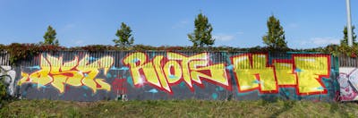 Yellow and Red Street Bombing by OST, Riots and KCF. This Graffiti is located in Leipzig, Germany and was created in 2010.